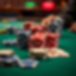 A close-up of poker chips and cards on a green felt table